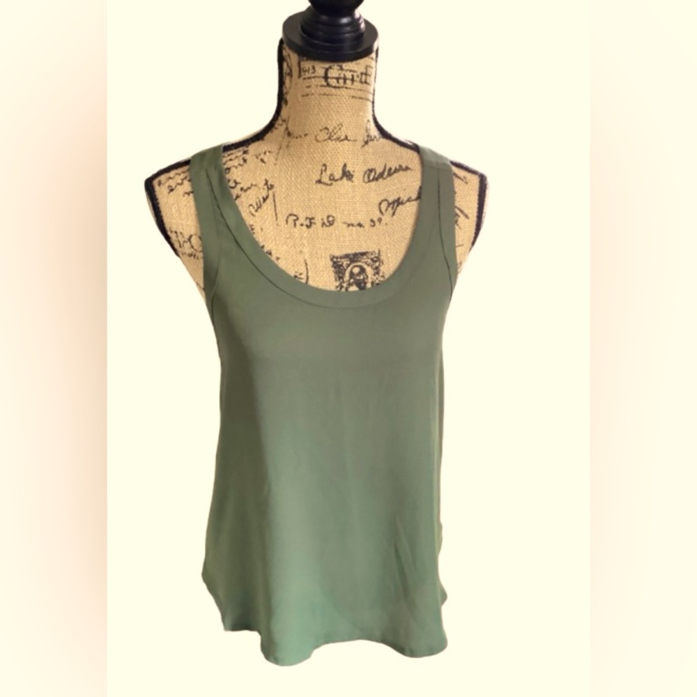 Beautiful olive green Express racerback tank top Ladies’ S. Gold zipper in back.